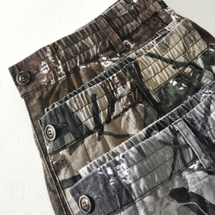 Pantalones cortos de camuflaje del Distrito Nueve