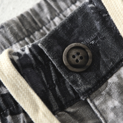 Pantalones cortos de camuflaje del Distrito Nueve