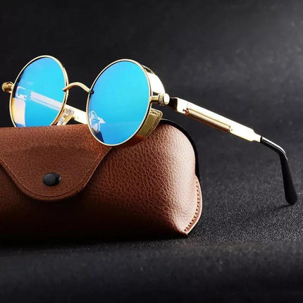 Anteojos de sol edición limitada Eclipse, metal dorado, lentes azules, estuche de cuero, unisex.