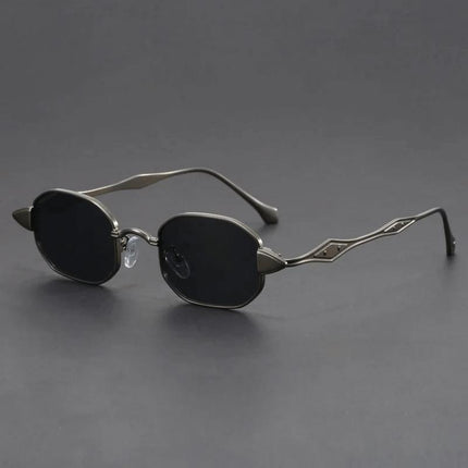 Anteojos de sol Neo Ciberpunk con lentes octogonales, patillas metálicas negras, diseño futurista para audaces.