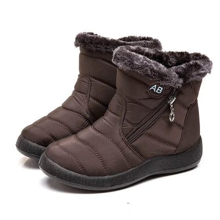 Botas de mujer impermeables chic con abrigo interior, diseño moderno en marrón oscuro, ideales para el invierno en Argentina.