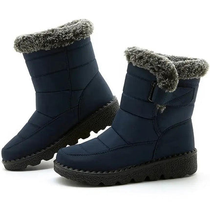Bota Polar Trendy impermeable de mujer, azul con interior de felpa gris y suela antideslizante para climas fríos.
