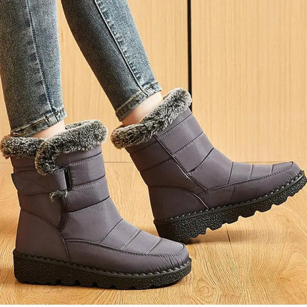 Bota Polar Trendy impermeable para mujer, color gris, con interior de felpa, suela antideslizante y cierre velcro.