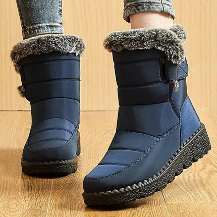 Bota Polar Trendy azul impermeable para mujer con felpa, suela antideslizante y cierre velcro, ideal para invierno.