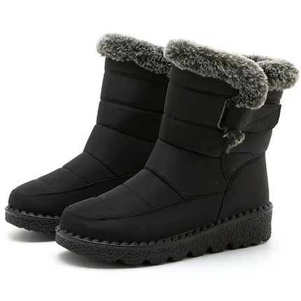 Bota Polar Trendy impermeable para mujer, negra, con interior de felpa gris, ideal para invierno y días lluviosos.