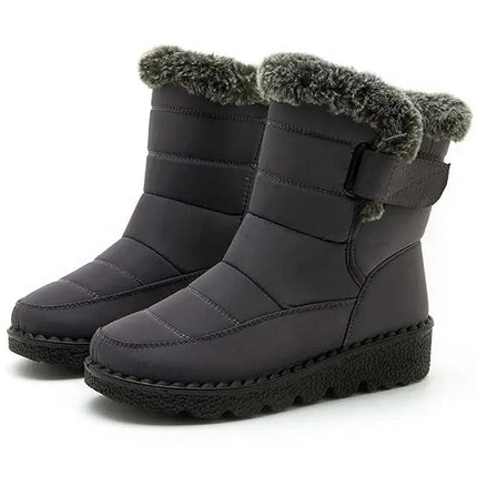 Bota Polar Trendy impermeable gris oscuro, material resistente, interior de felpa, suela antideslizante, ideal para mujeres.