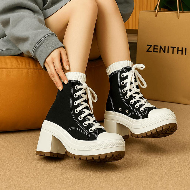 Bota negra de lona resistente para mujer con plataforma alta y cordones, estilo streetwear urbano argentino.