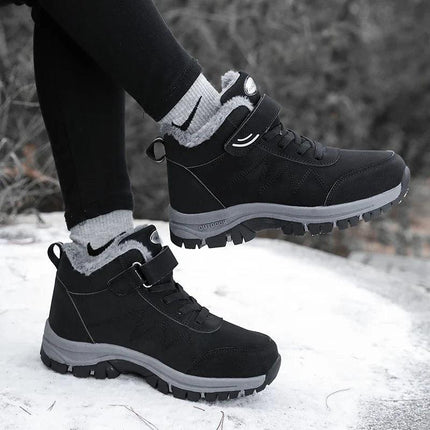 Botas de nieve negras para adultos, antideslizantes e impermeables, ideales para el invierno en terreno nevado.