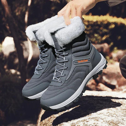 Botas de senderismo gris oscuro para hombre, forro cálido de piel, diseño resistente para clima frío.