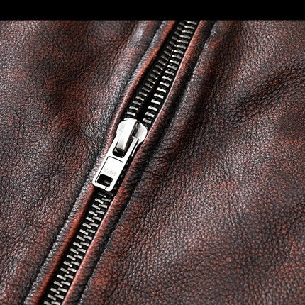 Campera de cuero marrón 100% vacuno para adultos, cierre metálico visible, ideal para un look elegante y moderno.