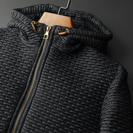 Campera acolchada negra para adultos, tejido viscosa con acabado liso y cierre dorado, ideal para cualquier temporada.