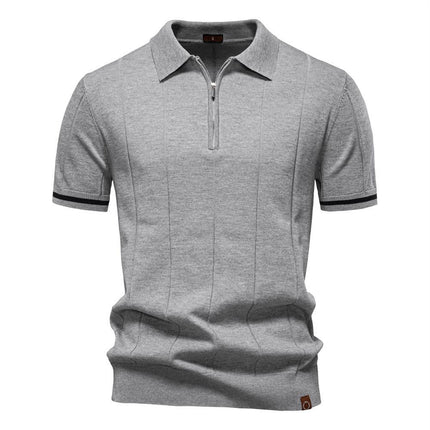 Chomba gris para hombre de ajuste ceñido en mezcla de algodón, con canalé vertical y detalles contrastantes en mangas.