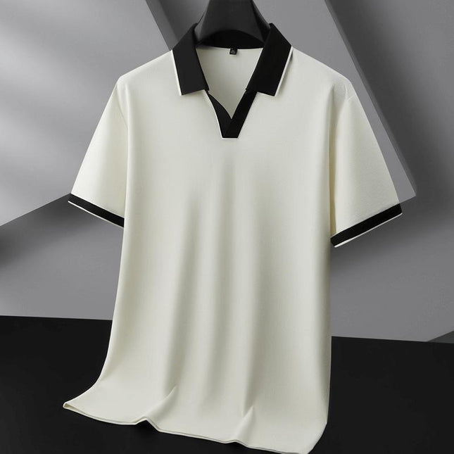 Polo Odyssey blanco de punto suave con cuello negro, ideal para hombres; elegante para la oficina, cómodo para el día a día.