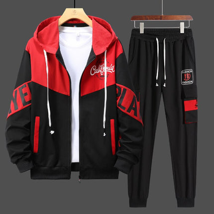 Conjunto deportivo urbano para hombre, estilo moderno, buzo rojo y negro con capucha y pantalón con cintura elástica.