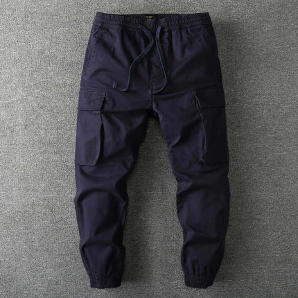 Pantalón militar camuflado azul oscuro para hombre, diseño cargo, ideal para actividades al aire libre.