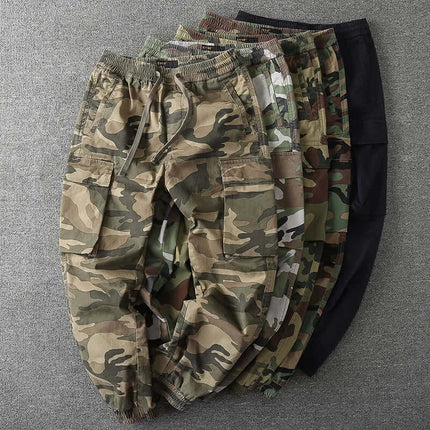 Pantalón hombre camuflado militar de algodón, colores verde y marrón, estilo casual, ideal para aventuras al aire libre.