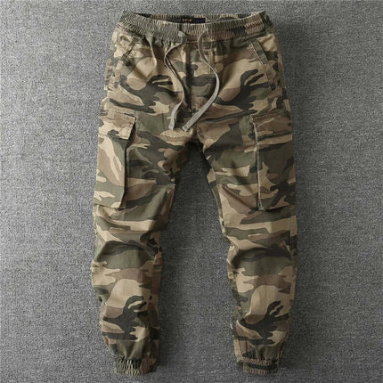 Pantalón camuflado militar para hombre, estilo casual, tela resistente, ideal para exteriores, color verde y marrón.