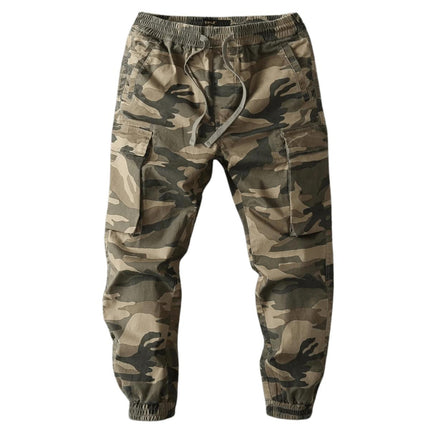 Pantalón militar camuflado para hombre en tela resistente, tonalidades verdes y marrones, ideal para uso urbano y actividades al aire libre.