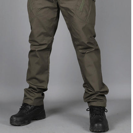 Pantalones cargo tácticos hombre verde oliva, resistentes, materiales duraderos, ideales para aventura urbana.