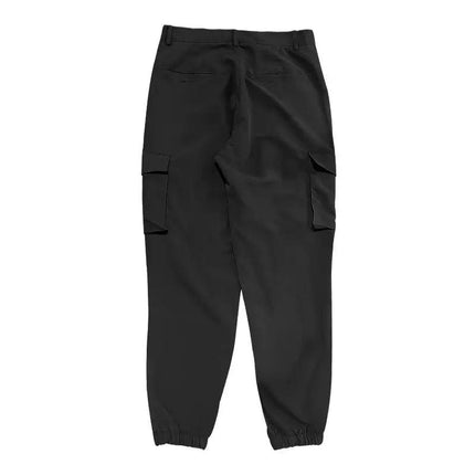 Pantalones deportivos negros versátiles para hombre, con bolsillos laterales, hechos de algodón, ideales para actividades al aire libre.