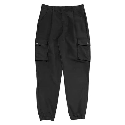 Pantalones deportivos negros para hombre, material resistente, con bolsillos laterales, ideales para uso diario o gimnasio.