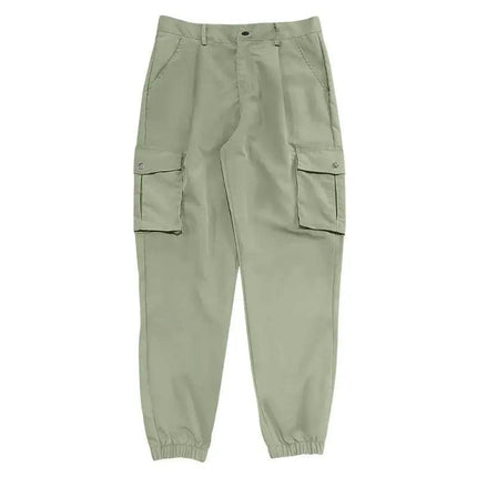 Pantalones deportivos versátiles de algodón verde oliva para adultos, con bolsillos amplios. Ideal para actividades casuales.