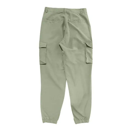 Pantalones deportivos verde oliva para hombres, algodón y poliéster, cómodos y versátiles, ideales para actividad física.