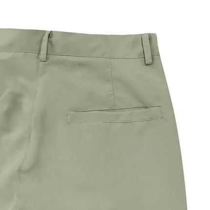 Pantalones deportivos de algodón en color verde oliva, diseño versátil unisex para actividades casuales y deportivas.