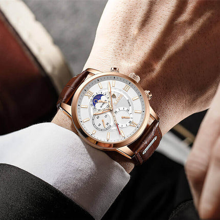 Reloj Lige para hombre con correa de cuero marrón y esfera dorada, ideal para ocasiones formales y casuales.