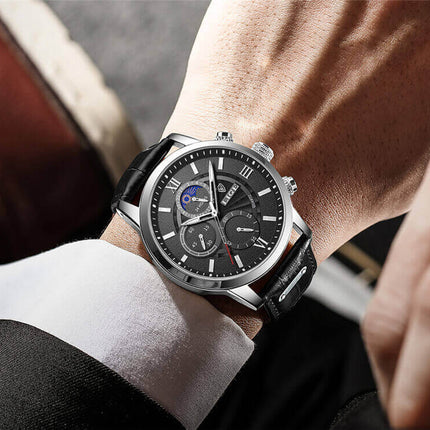 Reloj Lige hombre, correa cuero negra, cara plateada y negra, diseño elegante, ideal uso formal y casual.