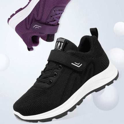 Zapatillas ComfyRun negras y moradas para adultos, con tejido respirable y suela liviana, ideales para actividades urbanas.