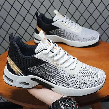 Zapatillas hombre de malla blancas y negras, diseño moderno, livianas y cómodas, ideales para uso diario.