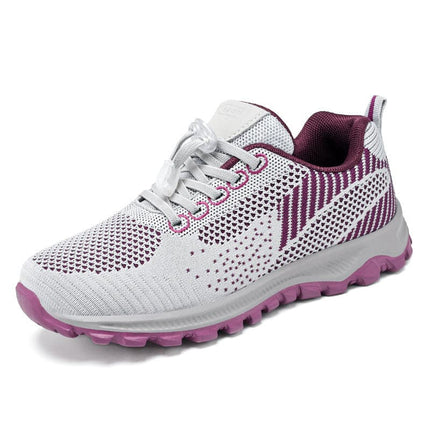 Zapatillas antideslizantes para caminar mujer, material ligero, color blanco con detalles púrpuras, diseño cómodo.