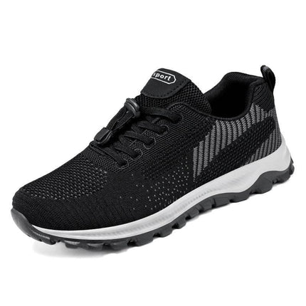 Zapatillas negras antideslizantes para caminar, diseño de punta ancha para mujer, cómodas para mayores, material flexible.