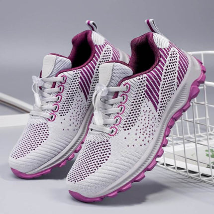 Zapatillas antideslizantes de mujer, blancas con detalles rosas, diseño de punta ancha y cuerpo ligero, cómodas para caminar.