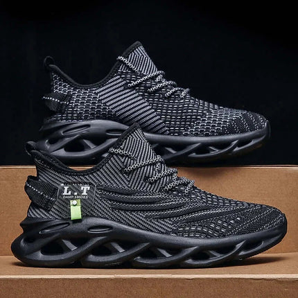 Zapatillas de running negras para hombre, ligeras y transpirables con diseño moderno y suela acolchada, estilo deportivo.