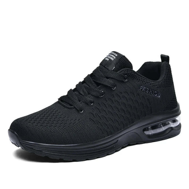 Zapatillas running para hombre, negras, resistentes y livianas. Diseño moderno con suela amortiguadora.