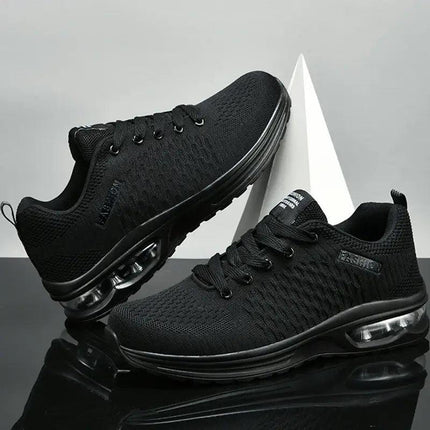 Zapatillas running hombre, resistentes y livianas, material de malla negra, deportivas, con suela antideslizante.
