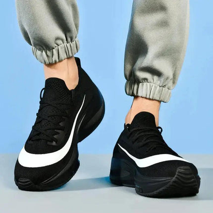 Zapatillas running ultralivianas negras con amortiguación profesional para hombre, suela elevada, ideales para entrenamiento.