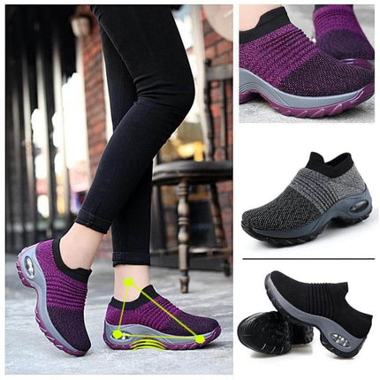 Zapatillas deportivas transpirables moradas y negras para mujeres, con material flexible y diseño de airbag clásico.