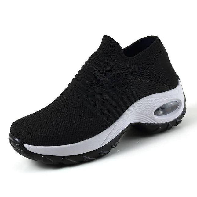 Zapatillas deportivas transpirables negro para correr, con amortiguador y diseño flexible, ideales para uso prolongado.