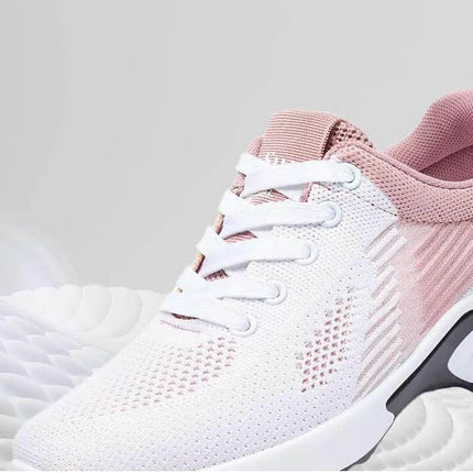 Zapatillas transpirables blancas y rosadas para correr, diseño ergonómico, suela anti-impacto para mujer.