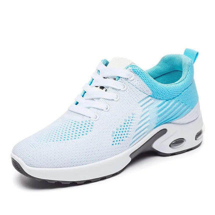 Zapatillas de correr transpirables blanco y celeste, diseño ergonómico para adultos, suela anti-impacto.