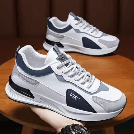 Zapatillas Urban Flow Hombre blancas y grises, estilo urbano, material sintético, para máximo confort diario.