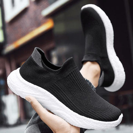 Zapatillas casuales de mujer, negras, hechas de material transpirable y ligero, ideales para uso diario y comodidad.