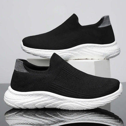 Zapatillas casuales de mujer, transpirables y ligeras, color negro, tejido elegante para comodidad diaria.