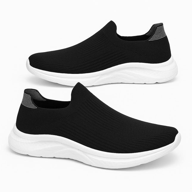 Zapatillas negras de mujer, transpirables y ligeras, diseño casual con suela blanca, ideales para uso diario.