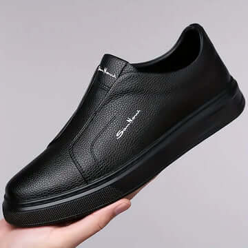 Zapato clásico moderno para hombre, cuero genuino negro, diseño elegante y cómodo ideal para el día a día.