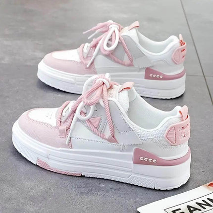 Zapatillas deportivas mujer blancas y rosas con suela antiimpacto, diseño ergonómico para confort diario.