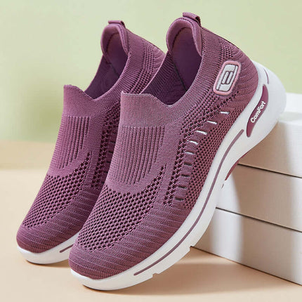 Zapato Marie Mujer color lila, tejido ergonómico, suela anti-impacto, ideal para un calce cómodo y seguro.